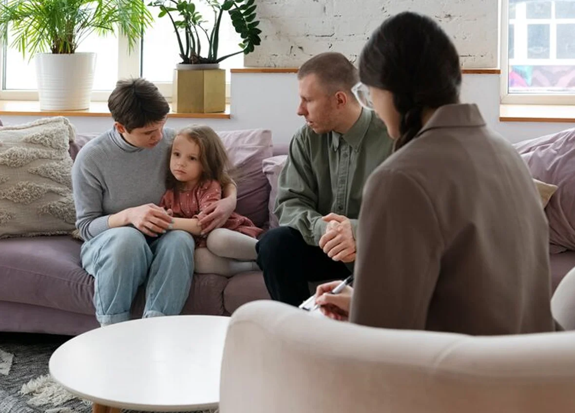 Family in a warm, supportive setting
