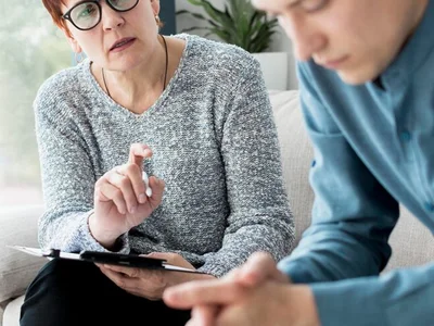 Person navigating change with therapeutic support
